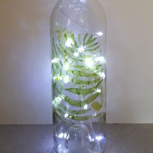 Etched and inked leaf wine bottle